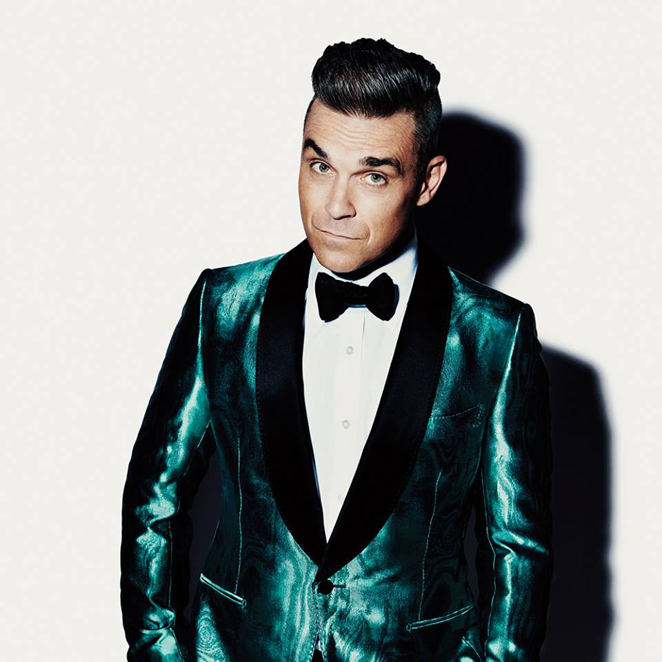 En este momento estás viendo Robbie Williams respodió tras críticas por haberse limpiado las manos en concierto
